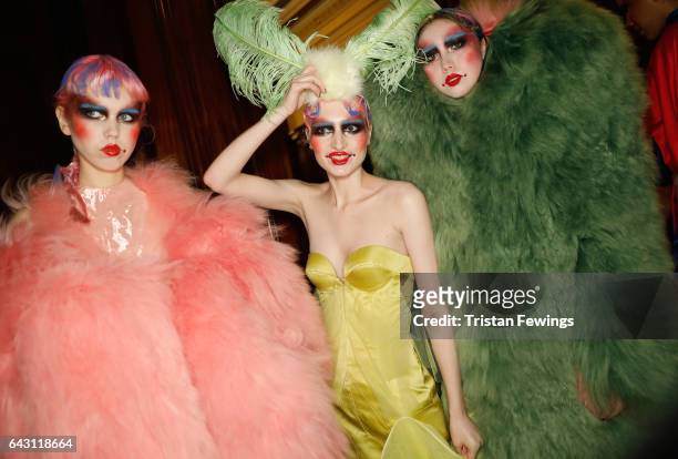 Models pose backstage ahead of the David Ferreira show during the London Fashion Week February 2017 collections on February 20, 2017 in London,...