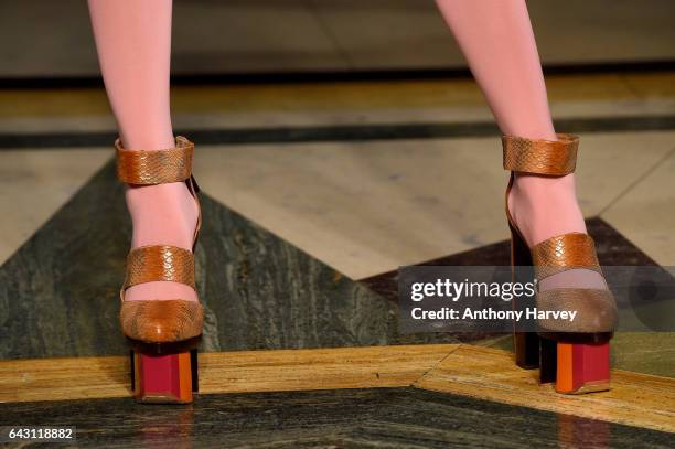 Model, detail, walks the David Ferreira runway show during the London Fashion Week February 2017 collections on February 20, 2017 in London, England.