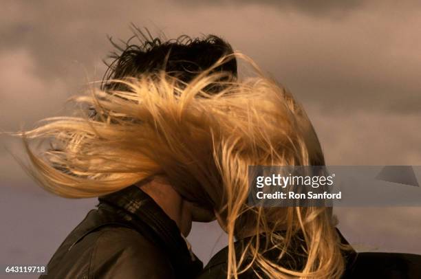 hair blowing in the wind. - 80's hair stockfoto's en -beelden