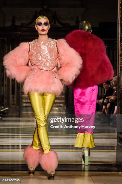 Model walks the runway at the David Ferreira show during the London Fashion Week February 2017 collections on February 20, 2017 in London, England.