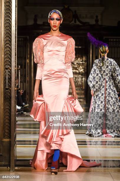 Model walks the runway at the David Ferreira show during the London Fashion Week February 2017 collections on February 20, 2017 in London, England.