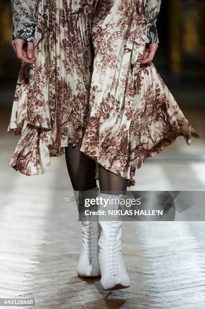 Model presents creations by Irish designer Sharon Wauchob during a catwalk show on the fourth day of the Autumn/Winter 2017 London Fashion Week in...