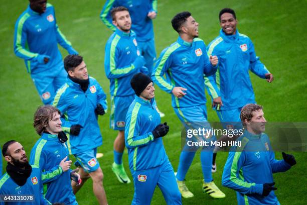 Players of Leverkusen warm up during the training prior the UEFA Champions League Round of 16 first leg match between Bayer Leverkusen and Club...