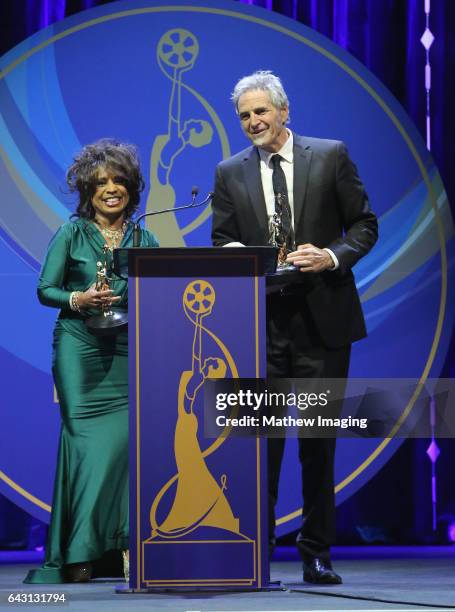 Hair stylists Pauletta Lewis-Irwin and Matt Danon, recipients of the Best Period and/or Character Hair Styling-Feature-Length Motion Picture Award...