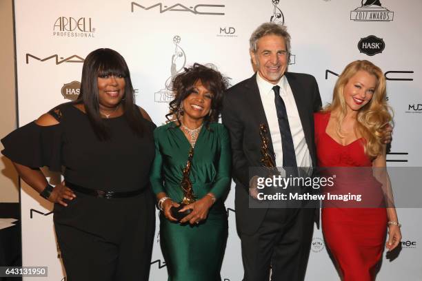 Host/comedian Loni Love, hair stylists Pauletta Lewis-Irwin, Matt Danon, recipients of the Best Period and/or Character Hair Styling-Feature-Length...