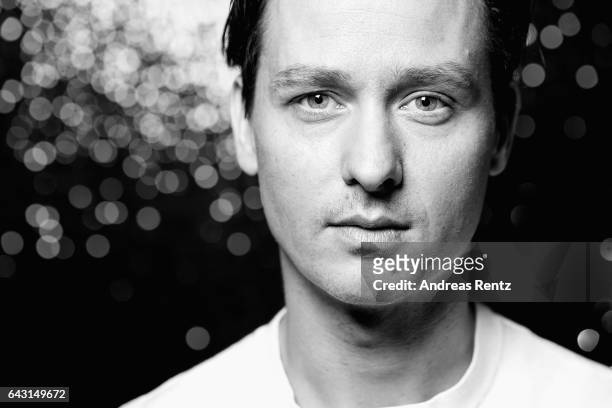 Actor Tom Schilling poses at the 'The Same Sky' portrait session during the 67th Berlinale International Film Festival Berlin at Berlinale Palace on...