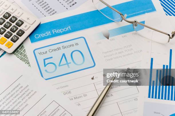 credit report form on a desk - credit report stock pictures, royalty-free photos & images