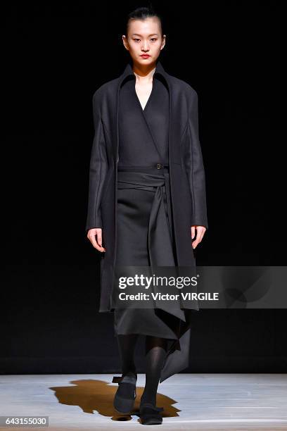 Model walks the runway at the CHALAYAN Ready to Wear Fall Winter 2017-2018 fashion show during the London Fashion Week February 2017 collections on...