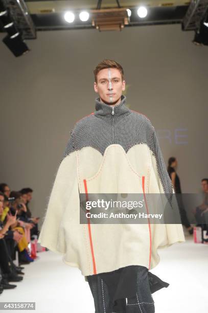 Model walks the runway at the Irynvigre show during the London Fashion Week February 2017 collections on February 20, 2017 in London, England.