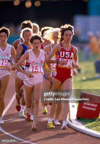 South African-born athlete Zola Budd competing for Great Britain and Mary Decker of the USA running in the women's 3000 metres final during the...