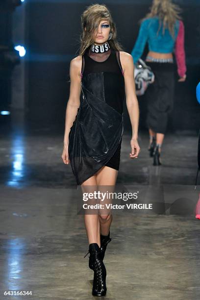 Gigi Hadid walks the runway at the VERSUS designed by Donatella Versace Ready to Wear Fall Winter 2017-2018 fashion show during the London Fashion...