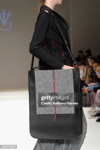 Model, bag detail, walks the runway at the Irynvigre show during the London Fashion Week February 2017 collections on February 20, 2017 in London,...