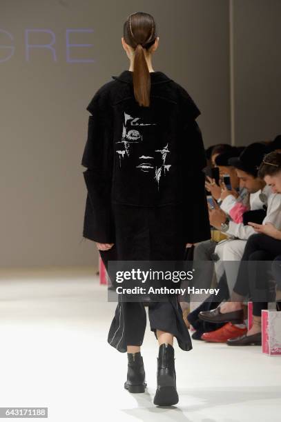 Model, back detail, walks the runway at the Irynvigre show during the London Fashion Week February 2017 collections on February 20, 2017 in London,...