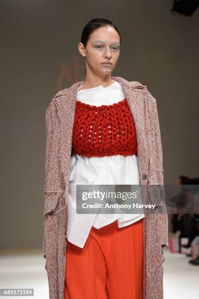 Model, outfit detail, walks the runway at the Irynvigre show during the London Fashion Week February 2017 collections on February 20, 2017 in London,...