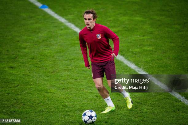 Antoine Griezmann of Atletico controls the ball during the training prior the UEFA Champions League Round of 16 first leg match between Bayer...