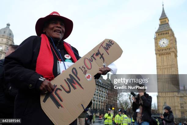 Thousands of protesters holding placards take part in a rally in Parliament Square against US president Donald Trump's state visit to the UK on...