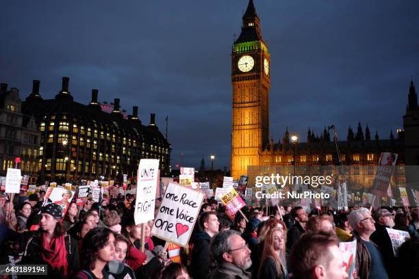 Thousands of protesters holding placards take part in a rally in Parliament Square against US president Donald Trump's state visit to the UK on...