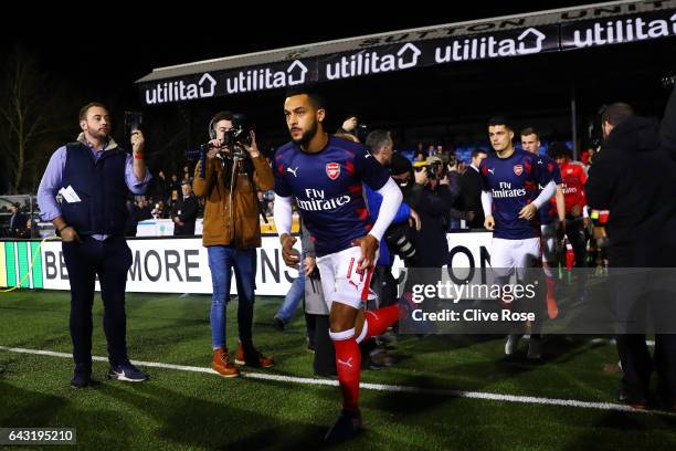 Theo Walcott, Granit Xhaka and Rob Holding of Arsenal run out for the warm-up before the Emirates FA Cup fifth round match between Sutton United and...