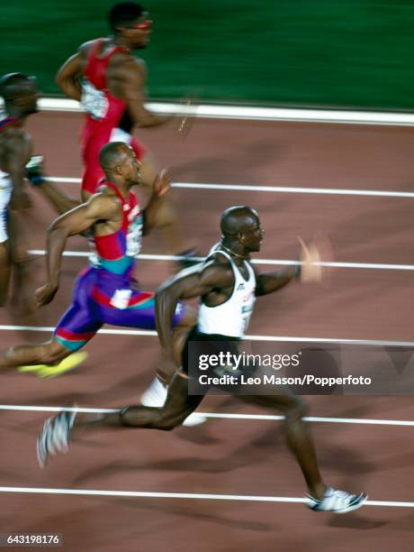Donovan Bailey of Canada enroute to winning the men's 100 metres final during the Summer Olympic Games in Atlanta, Georgia on 27th July 1996.