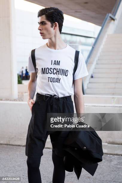 Model Rodrigo Laguna wears Zara trousers, Moschino t-shirt, Zara Jacket and H&M handbag at Ifema during Mercedes Benz Fashion Week Madrid Autumn /...