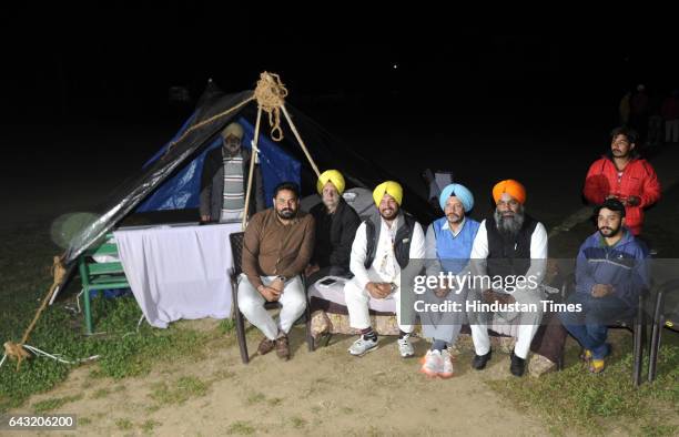 Candidates Jagtar Singh Rajla , Gurdev Singh Mann and Dr. Balbir Singh having dinner at their makeshift home outside the sealed 'strong room' where...