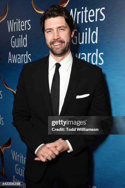 Tug Coker attends the 2017 Writers Guild Awards L.A. Ceremony at The Beverly Hilton Hotel on February 19, 2017 in Beverly Hills, California.