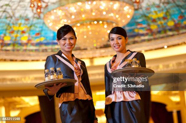 Hostesses pose on the gaming floor one day before the Galaxy Macau Grand Opening on Saturday May 14, 2011.