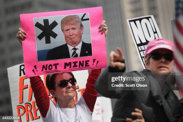 Demonstrators stage a Presidents Day protest near Trump Tower on February 20, 2017 in Chicago, Illinois. The demonstration was one of many anti-Trump...