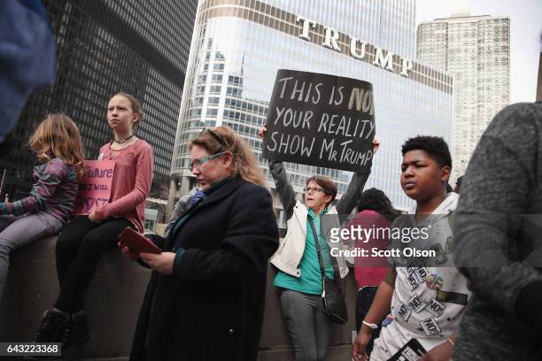 Demonstrators stage a Presidents Day protest near Trump Tower on February 20, 2017 in Chicago, Illinois. The demonstration was one of many anti-Trump...