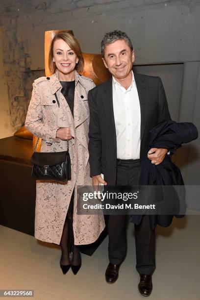 Marco Gobbetti and guest wearing Burberry attends the Burberry February 2017 Show during London Fashion Week February 2017 at Makers House on...
