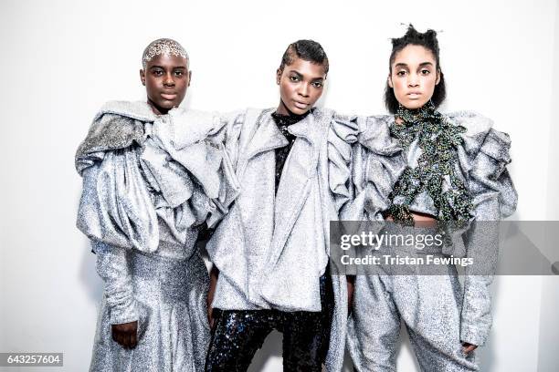 Models backstage ahead of the Hellavagirl show during the London Fashion Week February 2017 collections on February 20, 2017 in London, England.