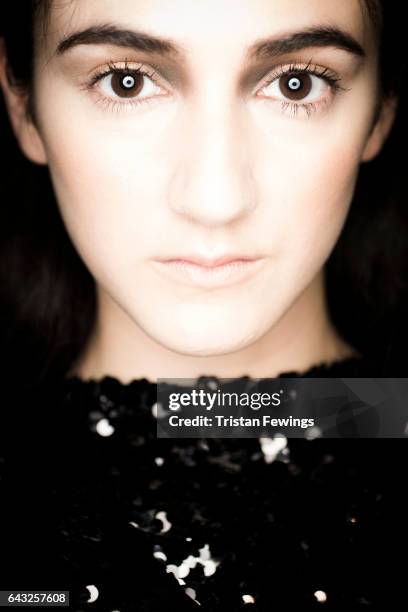 Model backstage ahead of the Hellavagirl show during the London Fashion Week February 2017 collections on February 20, 2017 in London, England.