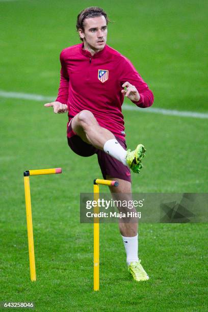 Antoine Griezmann of Atletico warms up during the training prior the UEFA Champions League Round of 16 first leg match between Bayer Leverkusen and...