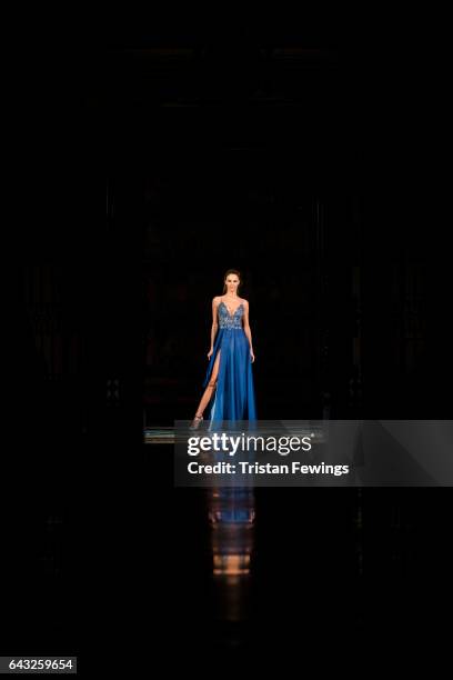 Model walks the runway at the Barrus show during the London Fashion Week February 2017 collections on February 20, 2017 in London, England.