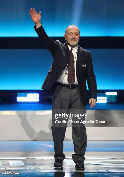 Top 100 player Bryan trottier waves to the audience onstage during the NHL 100 presented by GEICO show as part of the 2017 NHL All-Star Weekend at...