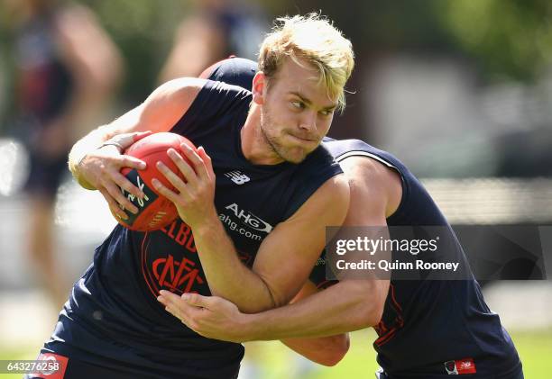 Jack Watts of the Demons is tackled by Angus Brayshaw of the Demons during a Melbourne Demons AFL training session on February 21, 2017 in Melbourne,...