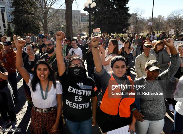 Youth protesters from left to right Joi Lynch, Nancy Palacios, Sofia Jenkins, and Nafeefa Kariem, right, put up their fists as they participate in a...