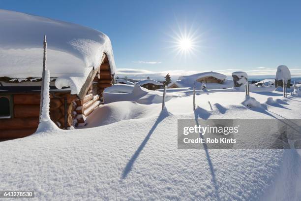 snowbound village at sunrise - cabin norway stock pictures, royalty-free photos & images