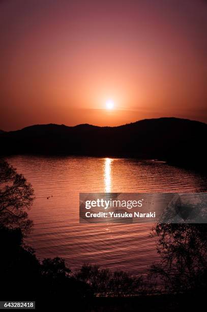 a small bay and sunset - 静寂 個照片及圖片檔