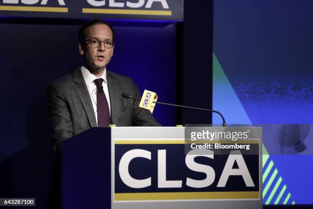 Evan Medeiros, managing director for the Asia-Pacific at Eurasia Group, speaks during a keynote presentation session at the 14th CLSA Japan Forum in...