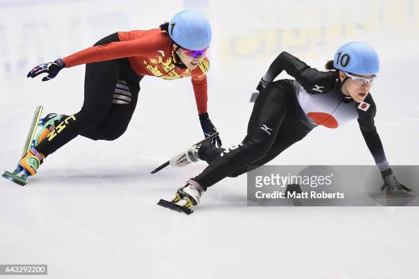 Yihan Guo of China and Kikuchi Sumire of Japan compete in the Women's 500 metre Short Track Speed Skating on day four of the 2017 Sapporo Asian...