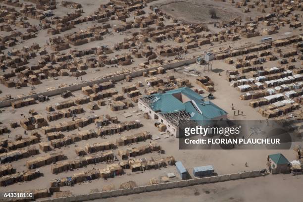 An aerial picture taken on February 14, 2017 at Monguno district of Borno State shows a camp for internally displaced people. The Nigerian airforce...
