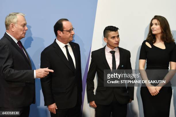 French Foreign Minister Jean-Marc Ayrault, French President Francois Hollande, and a former child soldier from Colombia Alberto Ortiz and French...