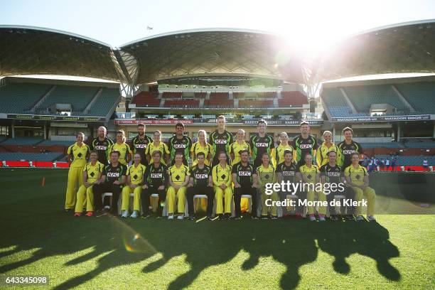 Members of the Australian mens cricket and women's Southern Stars cricket teams pose for a group photograph before a Australia T20 training session...