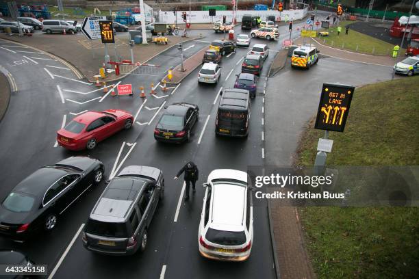 Three Rising Up! activists have blockaded the main access road into Heathrow Terminals 1, 2 and 3, by chaining themselves to a vehicle in protest...