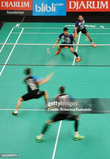 Sabar Karyaman Gutama and Franky Wijaya Putra of Tjakrindo Masters Indonesia compete against Lee Yong Dae and Ivanov Vladimir of Musica Champions...