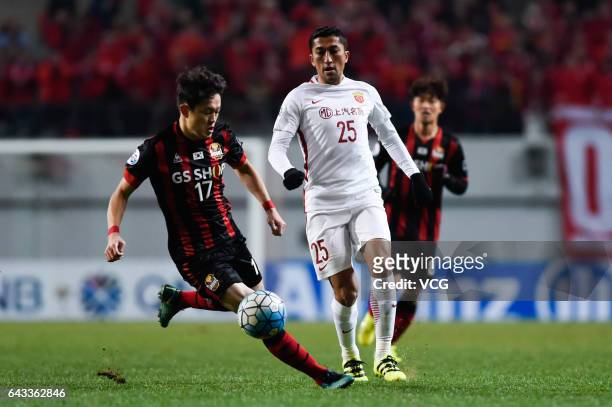 Odil Ahmedov of Shanghai SIPG and Shin Kwang-hoon of FC Seoul vie for the ball during the AFC Asian Champions League group match between FC Seoul and...