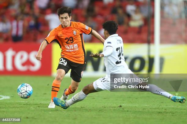 Joe Caletti of the Roar kicks during the AFC Champions League match between the Brisbane Roar and Muangthong United at Suncorp Stadium on February...