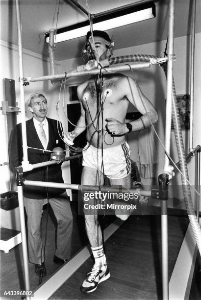 Former Olympic gold medallist David Hemery looks on as Mark McMahon is put through his paces in the new National Coaching Centre at the Wynne-Jones...