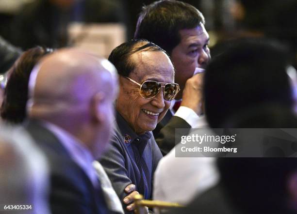 Fidel Ramos, the Philippines' former president, center, reacts as he attends the Asian Development Bank 50th Anniversary reception in Manila, the...
